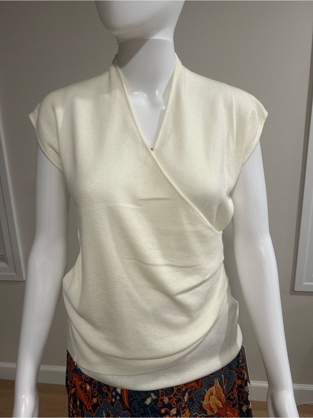 Women's Ivory Sleeveless Wrap-Style Top

New With Tags